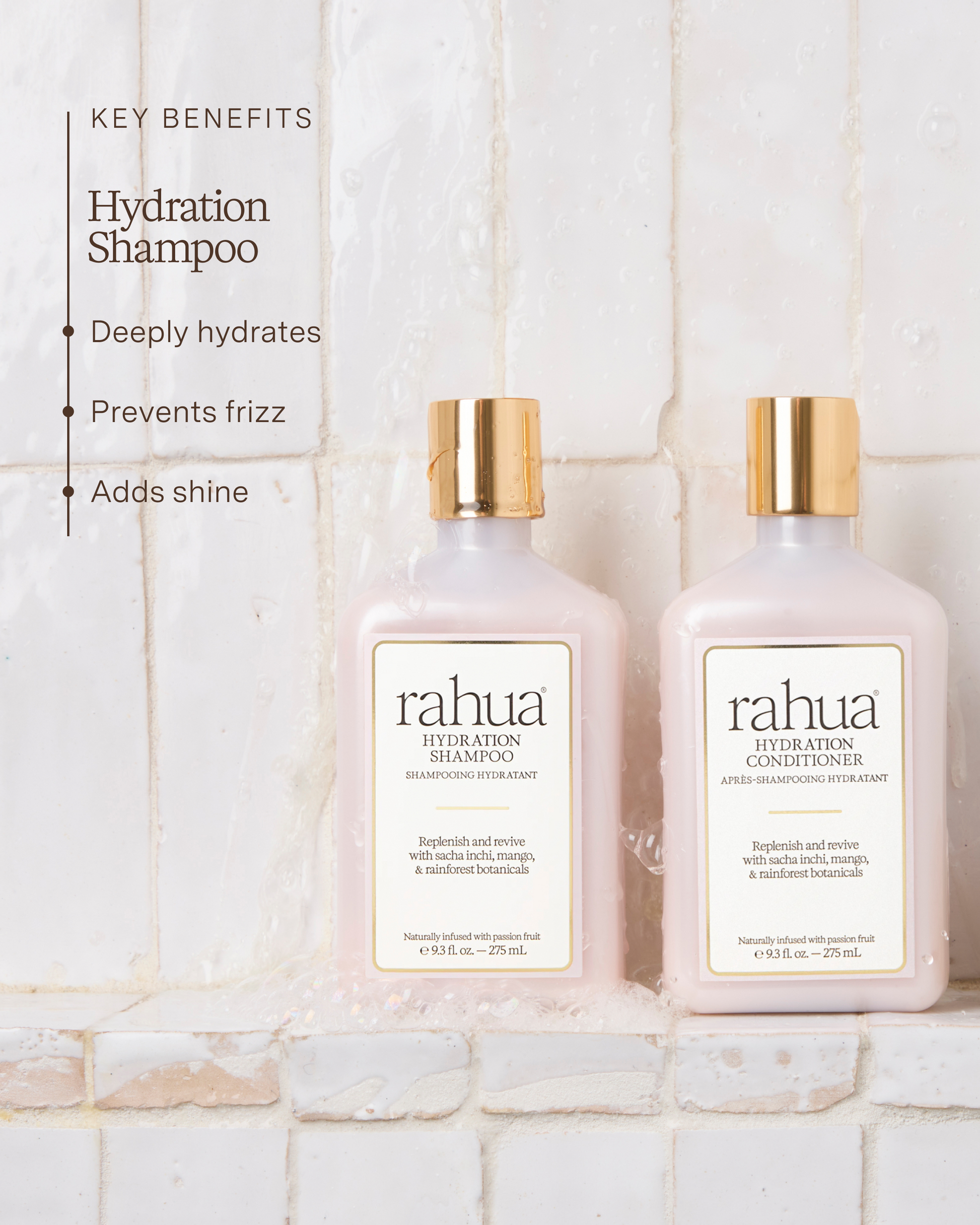 Two bottles of Rahua Hydration Shampoo and Conditioner on a tiled bathroom wall.|variant:93-oz,18-oz