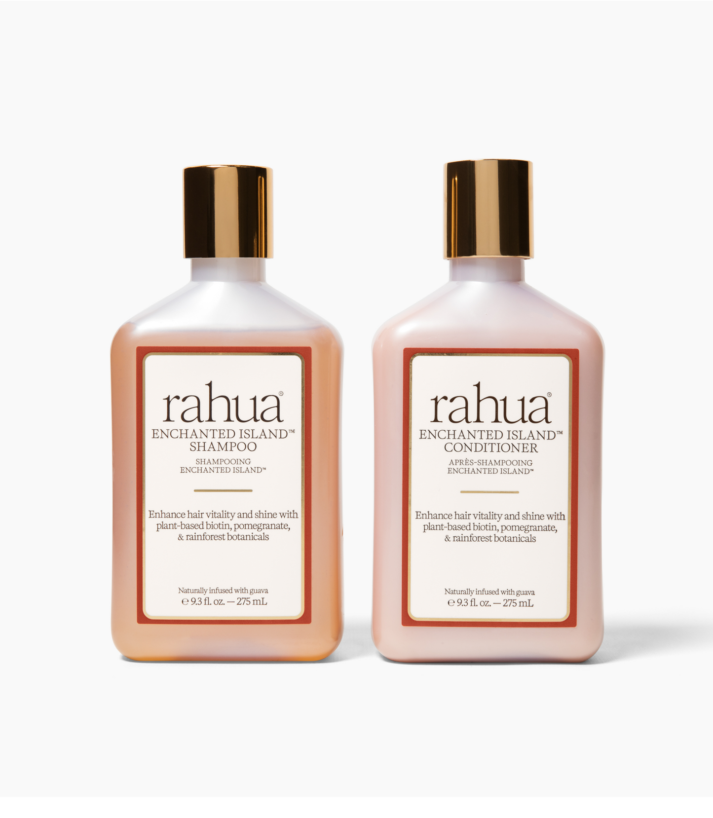 Two bottles of rahua Enchanted Island shampoo and conditioner on a white background|variant:93-oz
