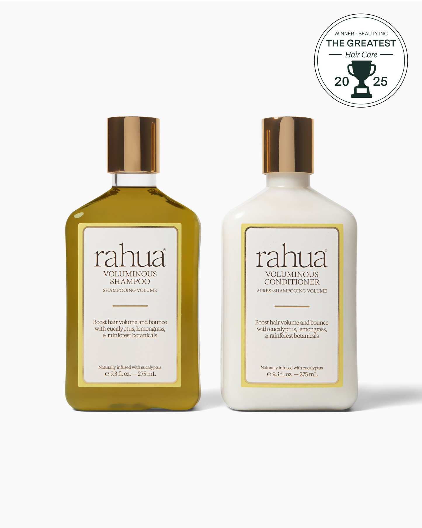 Two bottles of Rahua shampoo and conditioner on a white background with an award badge.|variant:93-oz