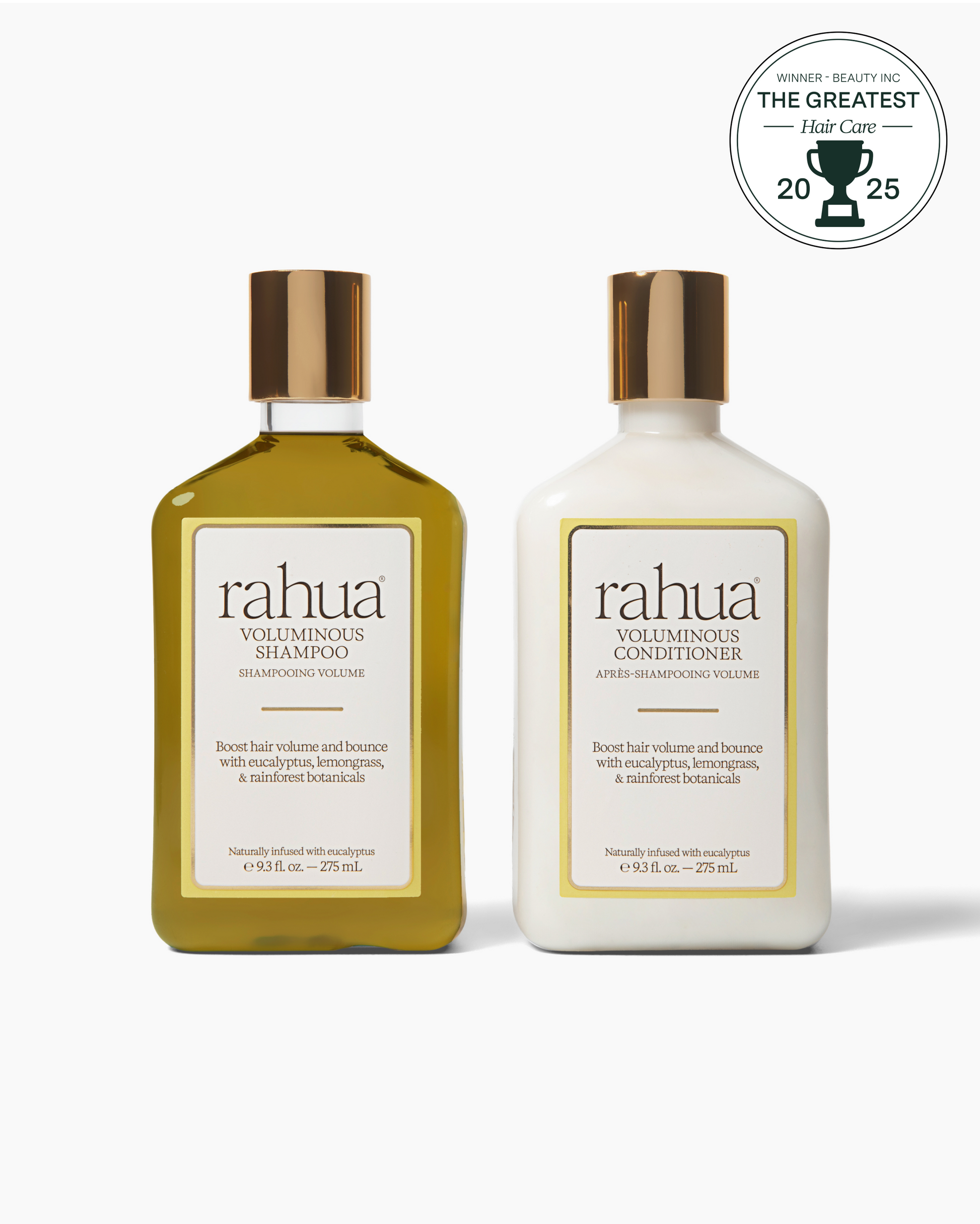 Two bottles of Rahua shampoo and conditioner on a white background with an award badge.|variant:93-oz
