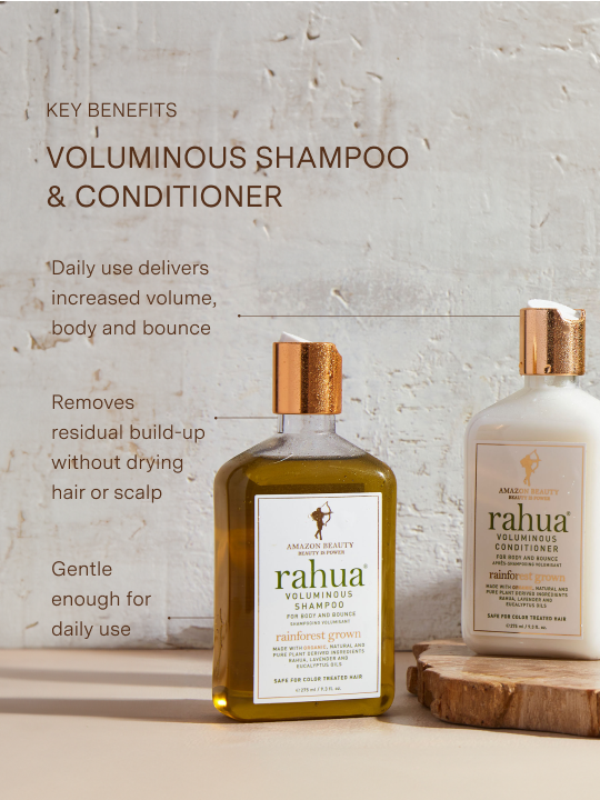 two bottles of rahua voluminous shampoo and conditioner on a stone textured background listing key benefits including increased volume and bounce, cleanse build up without drying hair or scalp and gentle for daily use|variant:93-oz